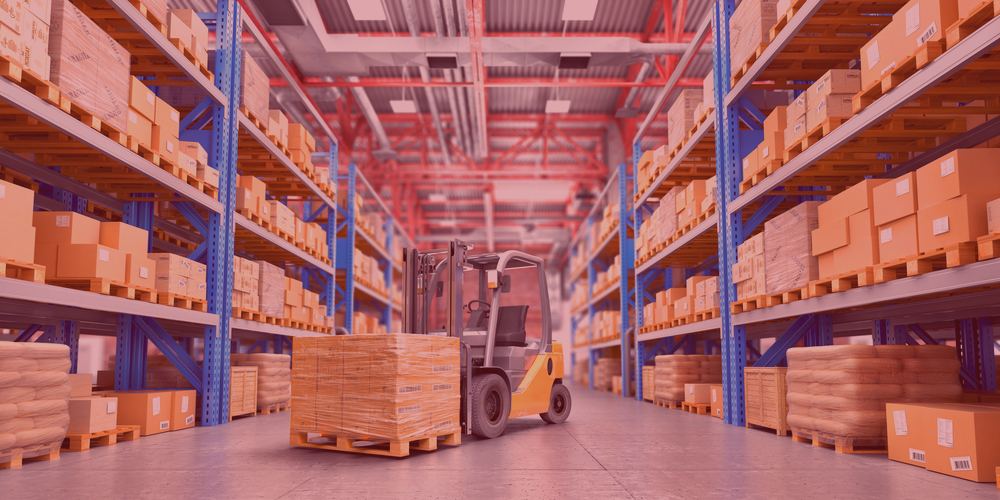 forklift with a full pallet in a warehousing & distribution center in a pink hue